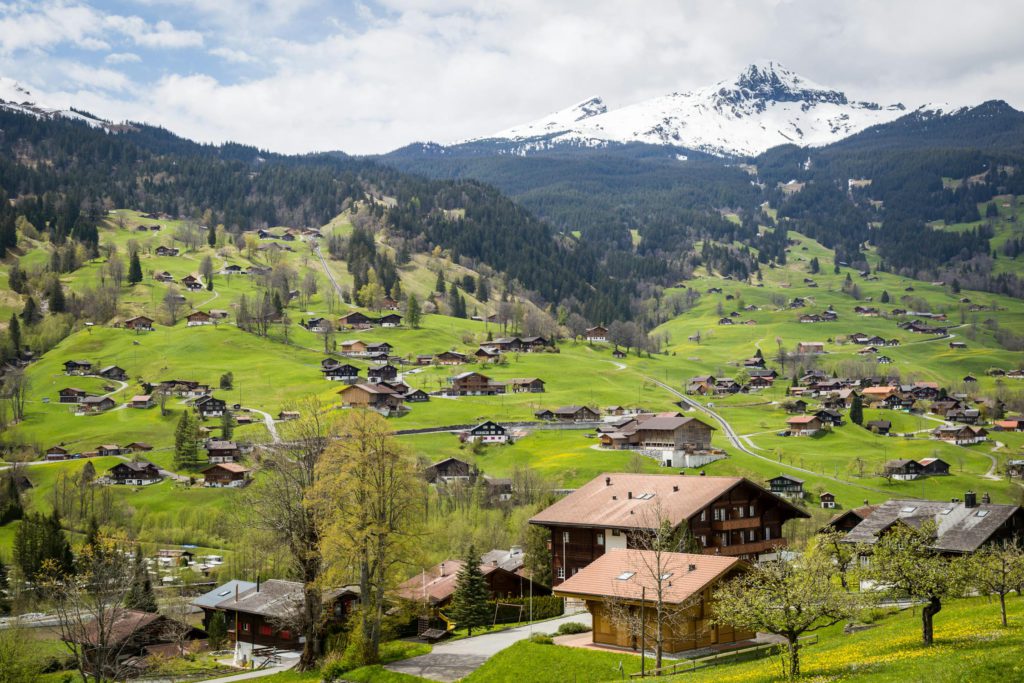 Interlaken : brown house under the blue sky