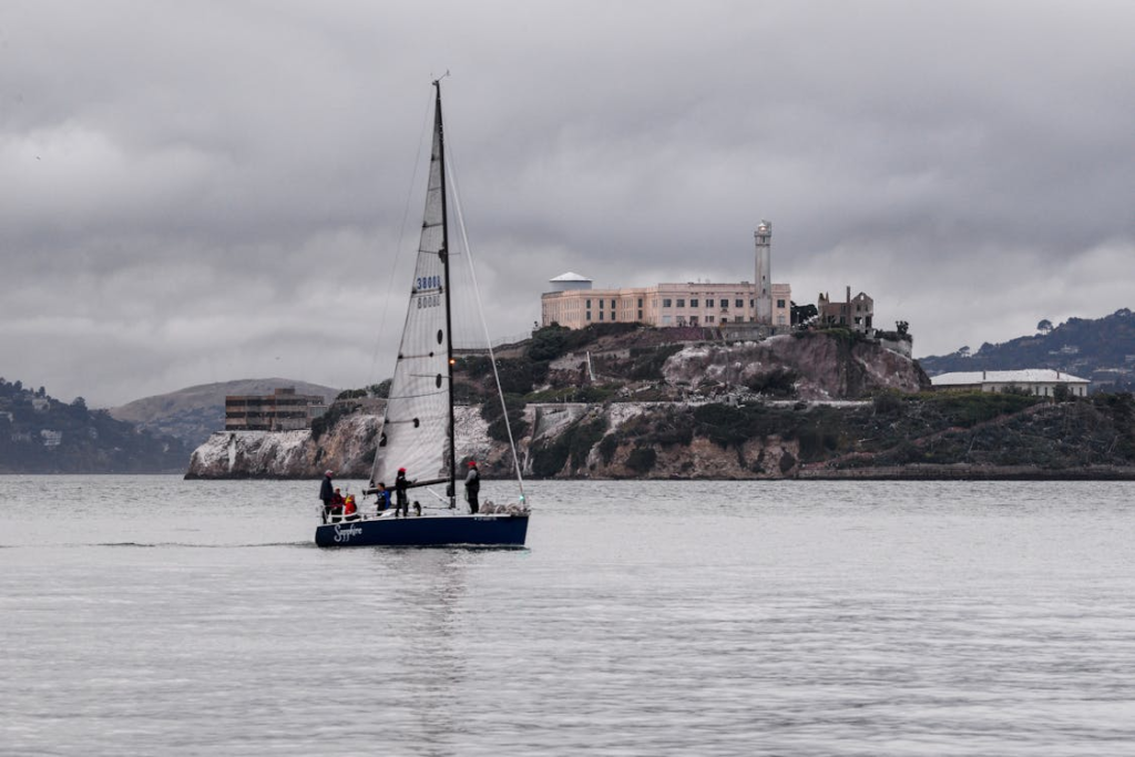 people sailing towards alcatraz