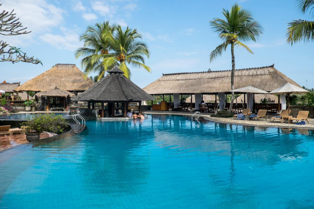 Warm Swimming Pool Beside Cottages, Bali, Indonesia